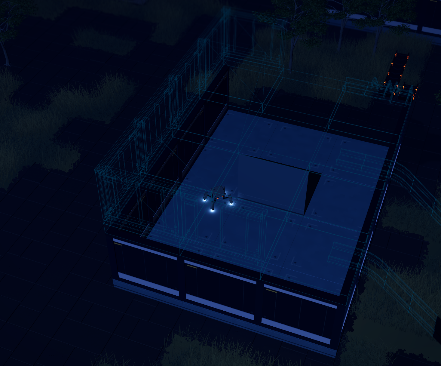 A dark blue wireframe view of a factory structure under construction